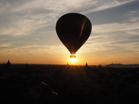 Airballoon Over The Sun During Sunrise