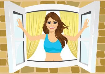 attractive woman opening her room s windows