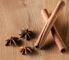 Cinnamon,  truestar on wooden  background