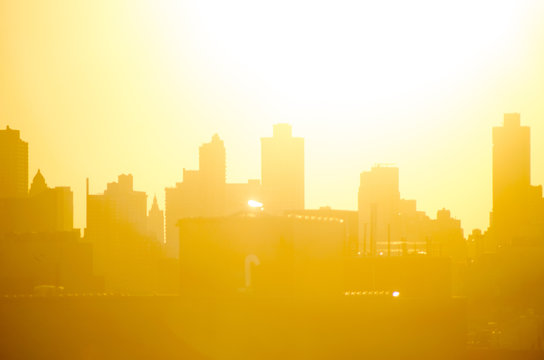 Background image of New York City Skyline at sunset