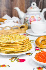 Stack of pancakes and red caviar