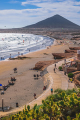 Surfers at the very windy beach of El Medano, tenerife
