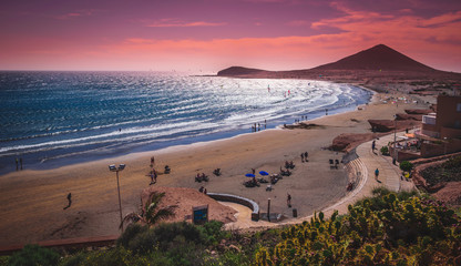 Surfers at the very windy beach of El Medano, tenerife