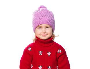 Little Funny girl in cap and red sweater.
