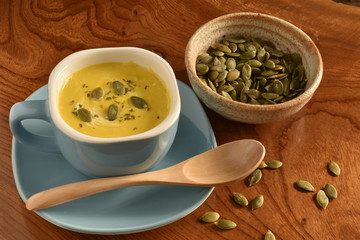 Pumpkin soup in a blue bowl