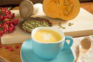 Pumpkin soup in a blue bowl