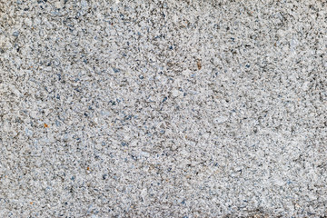Closeup of a grey concrete block wall texture background.