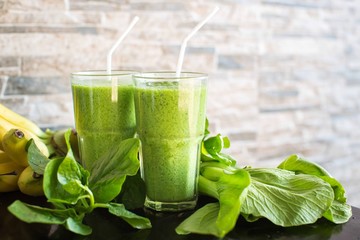 Fresh green smoothie with banana and spinach