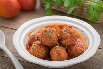 Meatballs in tomato sauce on plate