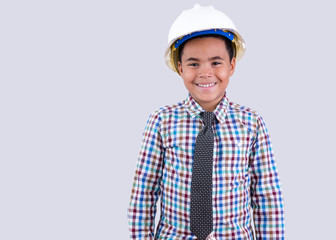 Cute little boy in hard hat and tie