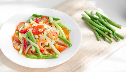 Famous papaya salad in Asia. Especially in Thailand, it's called