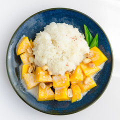 Sweet mango with sticky rice mix with coconut milk