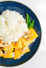 Sweet mango with sticky rice mix with coconut milk