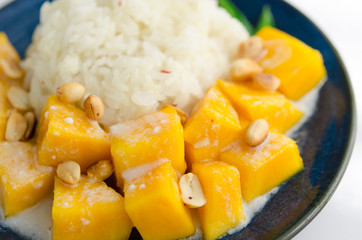 Sweet mango with sticky rice mix with coconut milk
