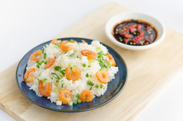 Asian street food. Sticky rice with dry shrimp and onion