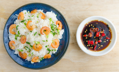 Asian street food. Sticky rice with dry shrimp and onion