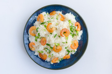 Asian street food. Sticky rice with dry shrimp and onion