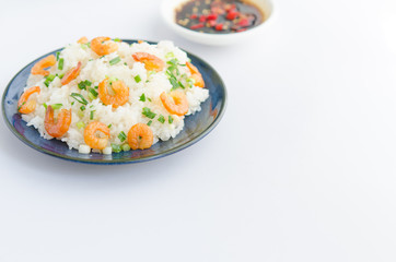 Asian street food. Sticky rice with dry shrimp and onion