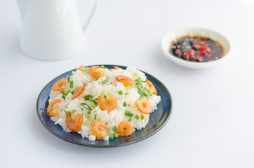 Asian street food. Sticky rice with dry shrimp and onion