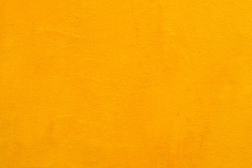 Fototapeta premium Concrete wall old yellow color for texture background.