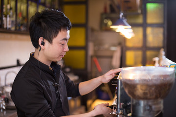 waiter serving in modern cafe