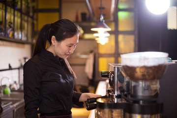 waitress serving in modern cafe
