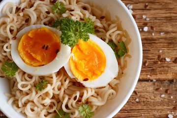 Two egg slices on chinese noodles