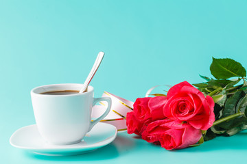 Obraz na płótnie Canvas cup of coffee with rose