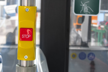 Stop on request button on bus