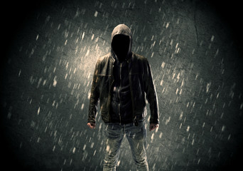Unknown suspect standing in the dark
