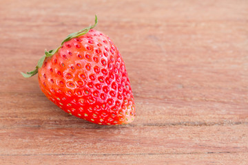 strawberries on wood background