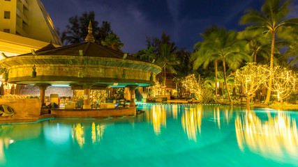 night view of beautiful swimming pool in tropical resort , Phuket, Thailand