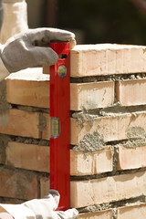 leveling the masonry bricks
