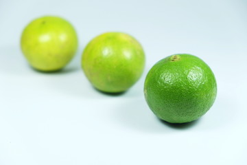 three lemon on white background