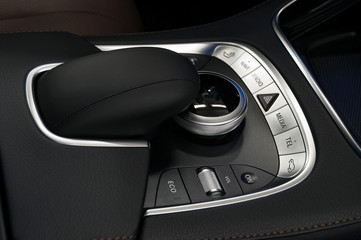 Car dashboard control buttons. Interior background.