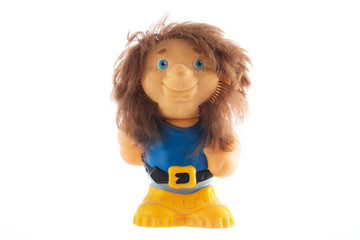 Retro rubber doll toy isolated on white background.