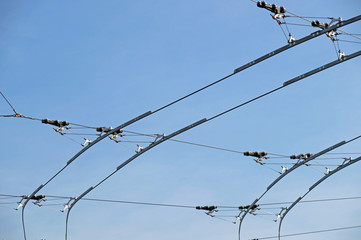 tram wires with blue sky background