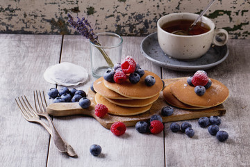Obraz na płótnie Canvas Pancakes with Berries and tea