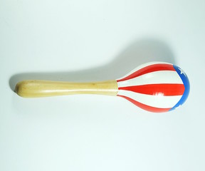 single maracas on white background