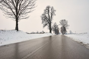 Ice on asphalt road.