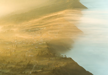 Village in morning mist.