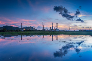 oil refinery at dawn