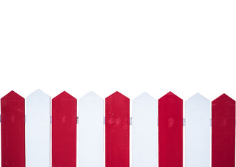 Old wooden red and white fence
