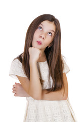 Cute girl deep in thought looking away