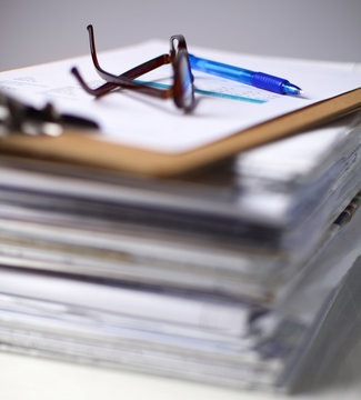 Big stack of papers ,documents on the desk
