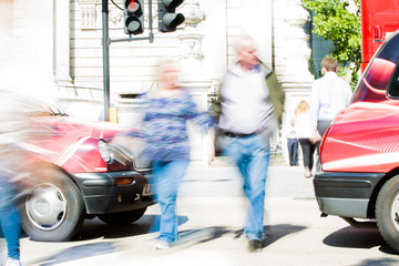 LONDON UK - SEPTEMBER 10, 2015: City of London lunch time. Lots of office people walking on the street. People blur