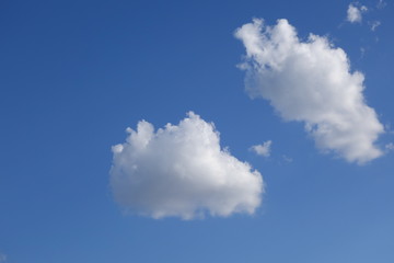 Cloud against clear blue sky background