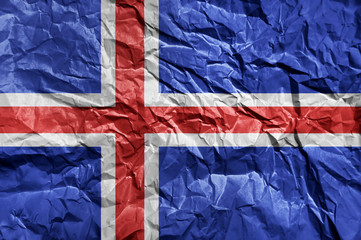 Iceland flag painted on crumpled paper background