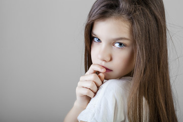 Portrait of a charming brunette little girl