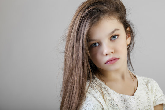 Portrait of a charming brunette little girl